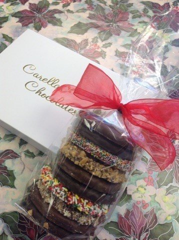 F - Half Pound of Chocolates Milk ad Dark, Bag of Gourmet Assorted Pretzels.