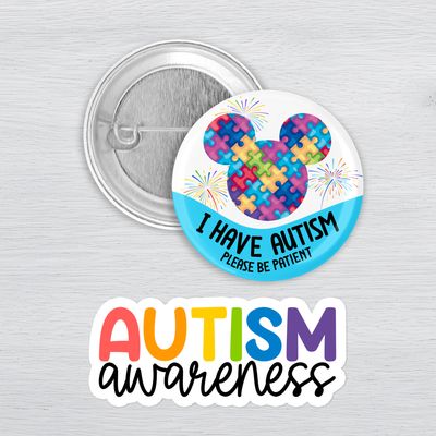 Colorful autism awareness sticker, invisible illness club ghost sticker, and dementia awareness pinback button displayed