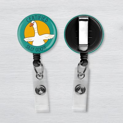 Certified Silly Goose badge reel with cartoon goose design on teal background, funny retractable ID holder for nurses and sta