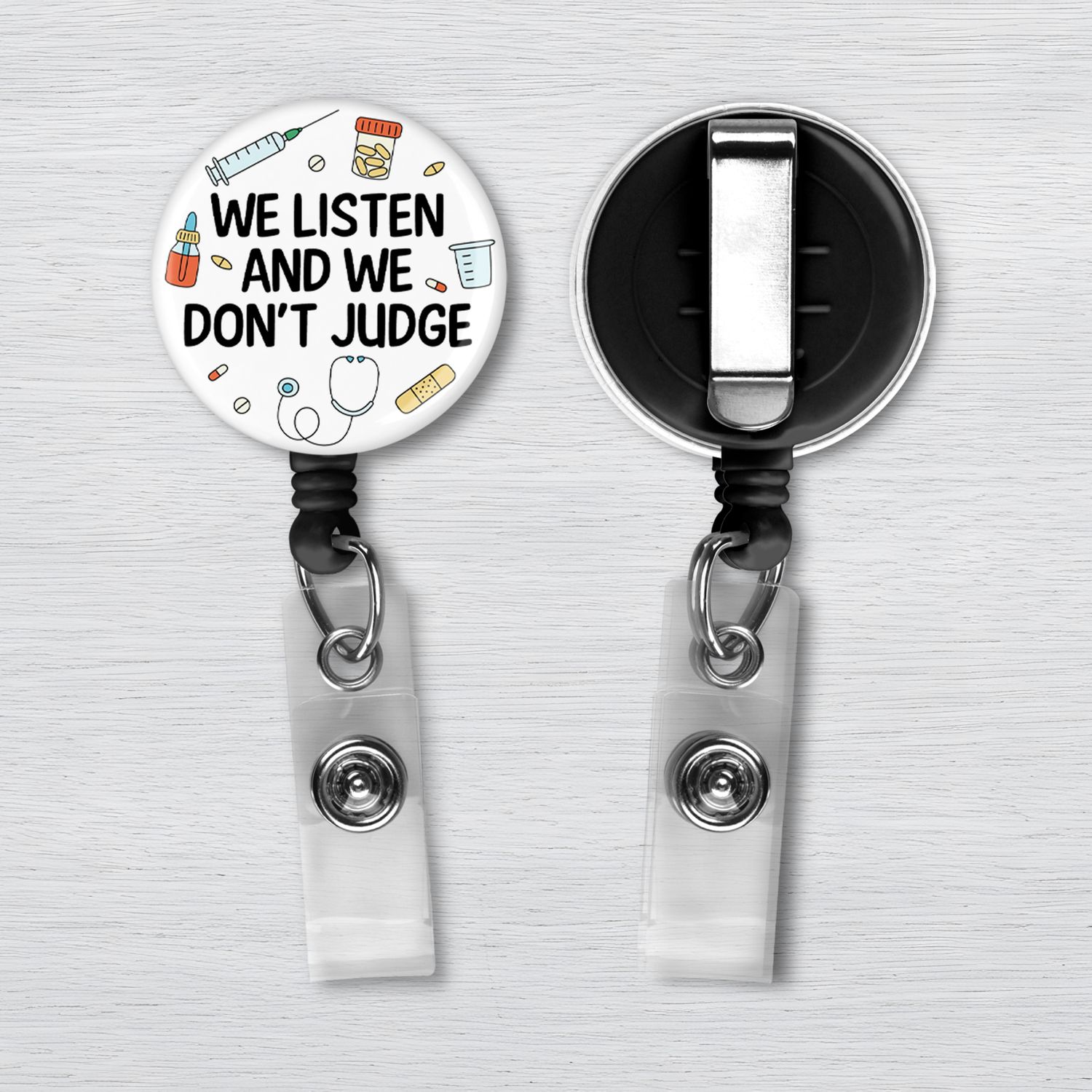 We Listen and We Don’t Judge Badge Reel | Funny Nurse Badge Holder Funny We Listen and We Don’t Judge retractable badge reel with healthcare icons including stethoscope, syringe, and pills.