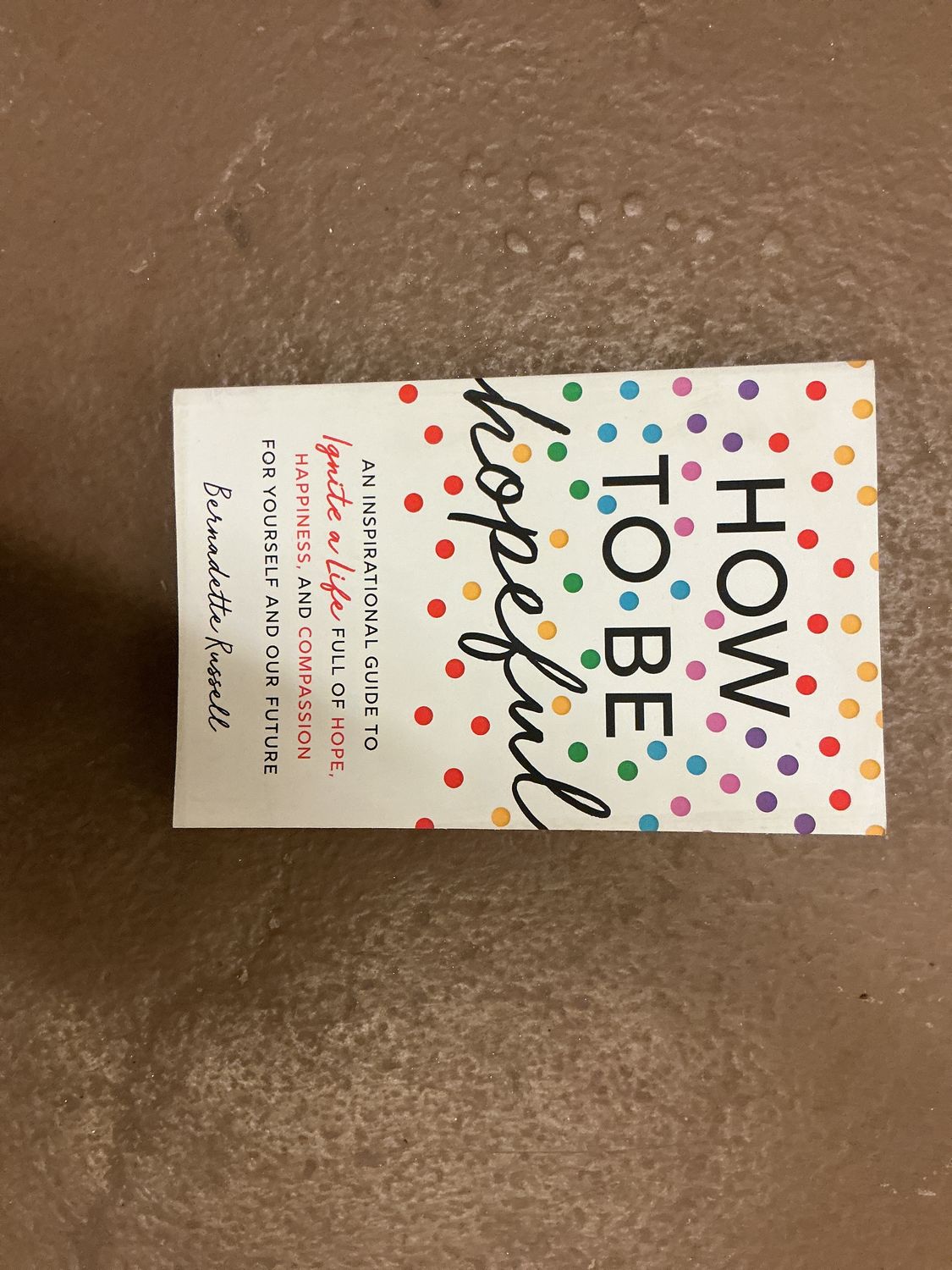 How to Be Hopeful - by Bernadette Russell (Paperback)