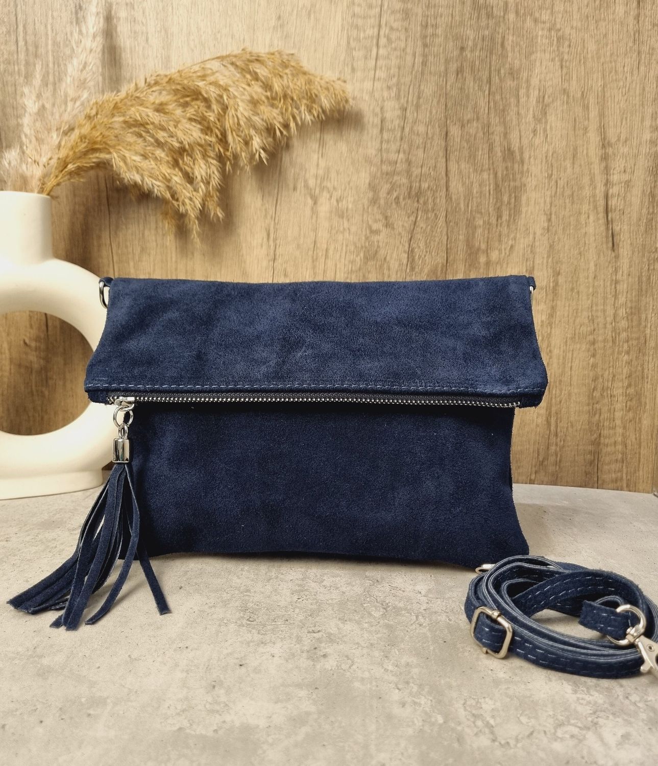navy purse with tassel