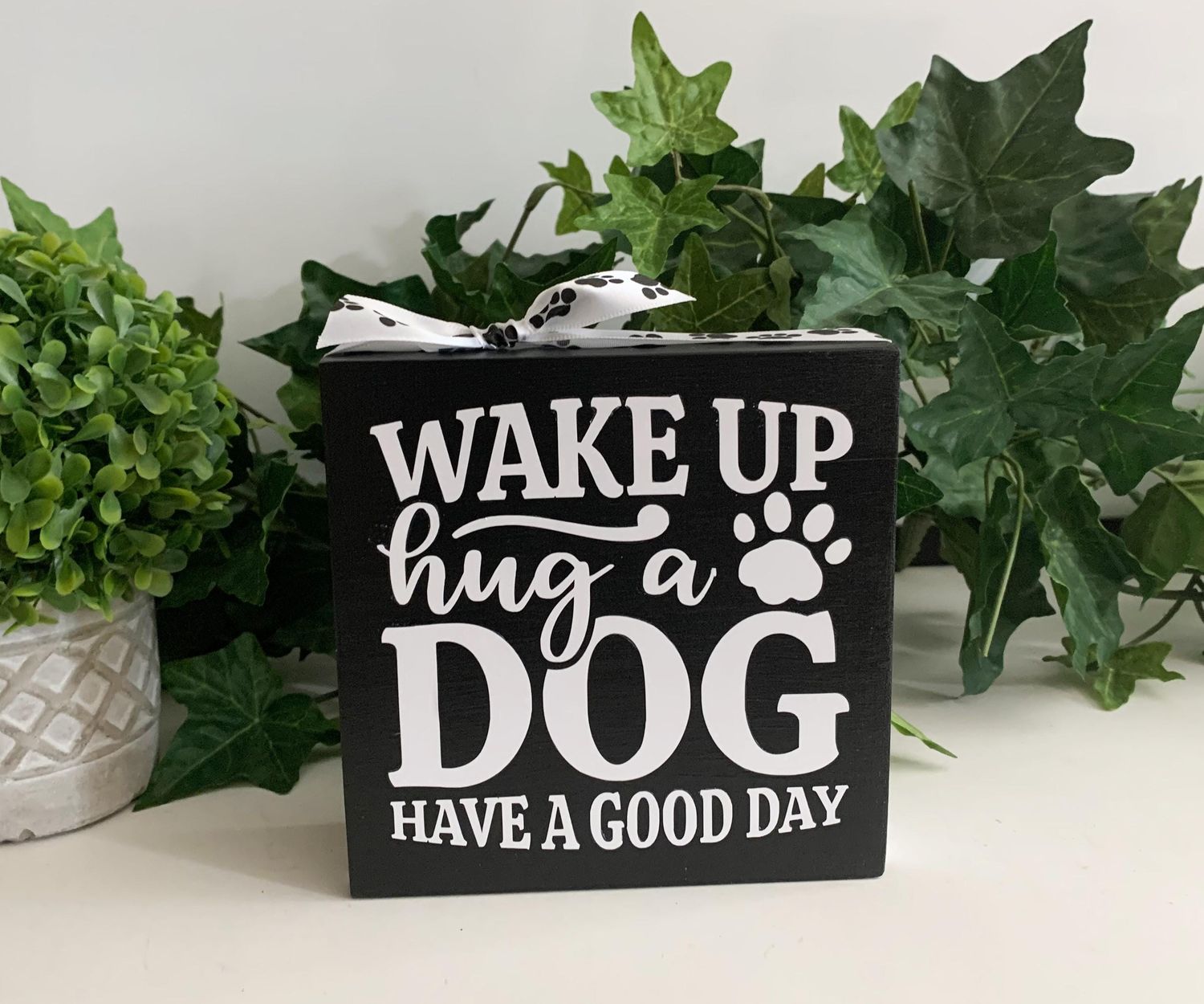 wake up hug dog sign