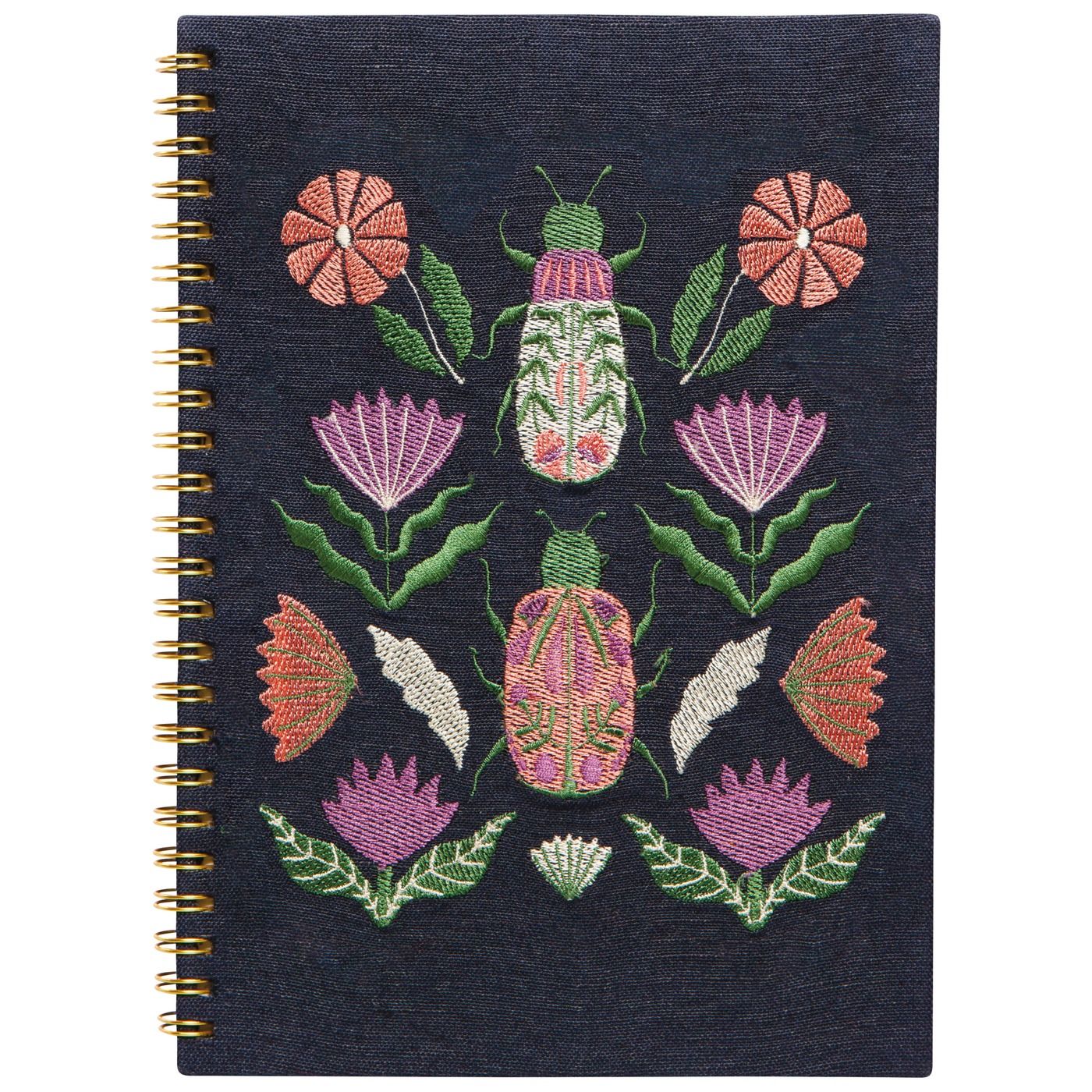 Amulet Embroidered Notebook Outer: 50% Cotton, 50% Linen; Body: Recycled Cotton Paper; Embroidery: Polyester W5.5 × L8 × H0.5" / 62 Ruled Pages