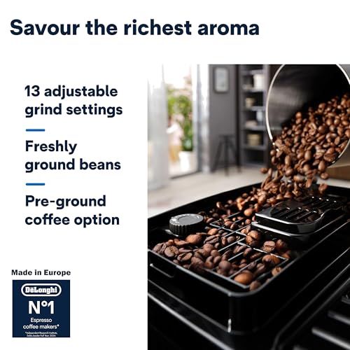 De'Longhi Magnifica Start ECAM222 Black Grey espresso machine with coffee beans pouring into the be…