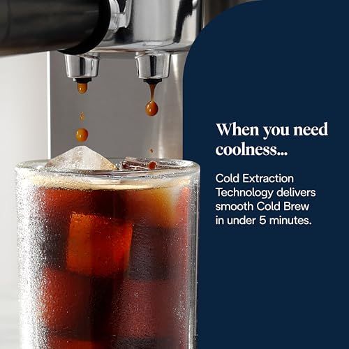 De'Longhi Dedica Duo EC890 Metal espresso machine dispensing cold brew coffee into a glass with ice…