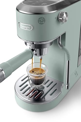 De'Longhi Dedica Duo EC890 Green espresso machine dispensing coffee into a glass cup on a stainless…