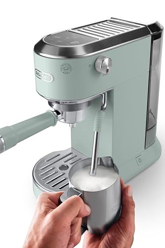 De'Longhi Dedica Duo EC890 Green espresso machine with hands frothing milk, sleek design, 15 bar pr…