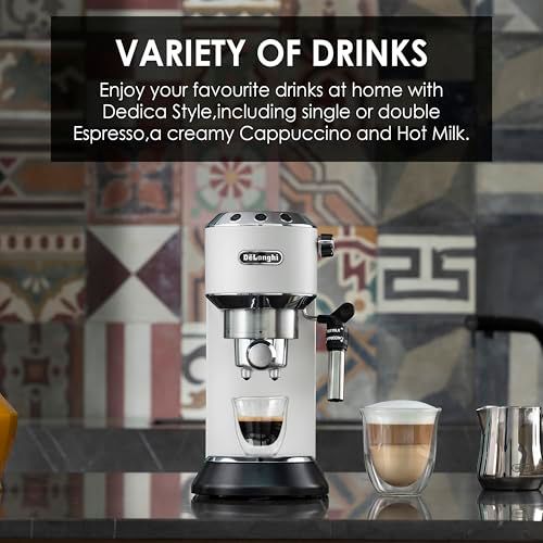 De'Longhi Dedica EC685 White espresso machine with steam frother and cups on a kitchen counter, fea…