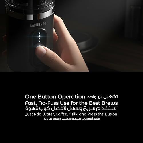 LePresso 4-in-1 portable espresso machine, sleek black design, hand holding device, button interfac…
