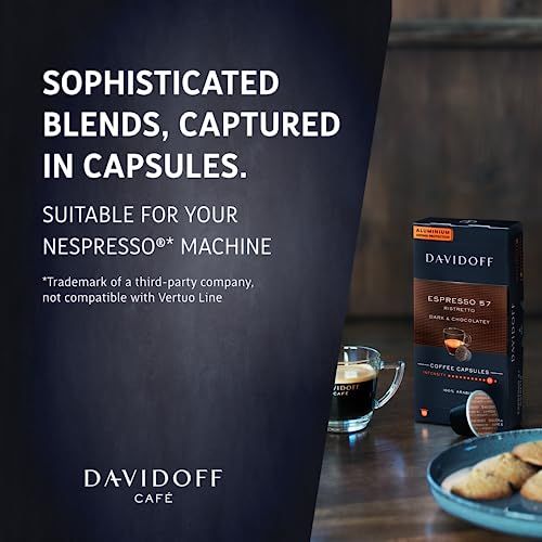 Davidoff Espresso 57 Nespresso coffee capsules box on a wooden table with a cup and cookies, suitab…