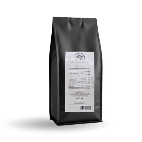 Black bag of First Bean Medium Roast House Blend 1kg coffee with white label and barcode on a plain…