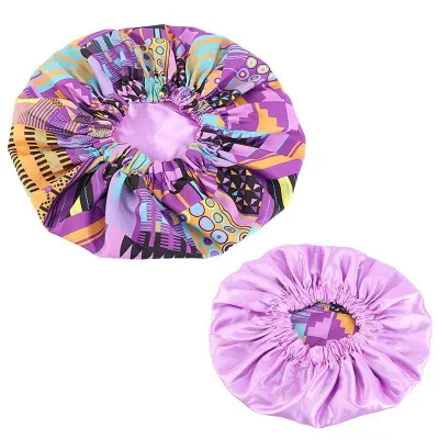 Bonnet de cheveux en tissu Kente rose/violet