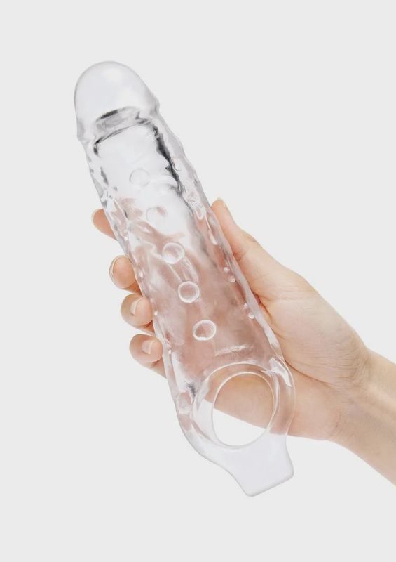 SU 1 IN. SEE-THRU STUDDED PENIS EXTENDER W/ BALL LOOP