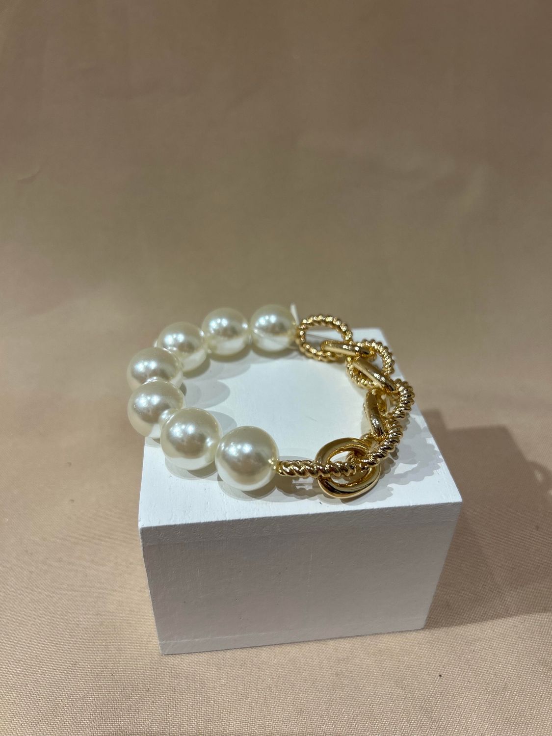PEARL W GOLD