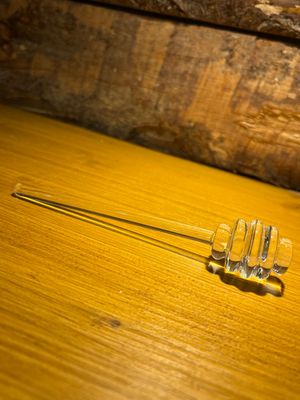 Bâton de miel en verre