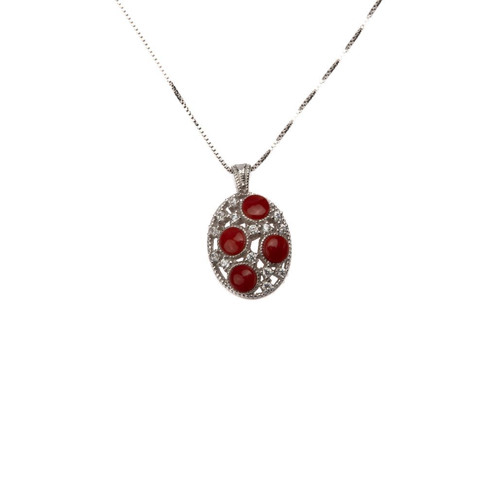 Collana con pendente ovale in corallo rosso e dettagli brillanti Collana con pendente ovale in corallo rosso e dettagli brillanti