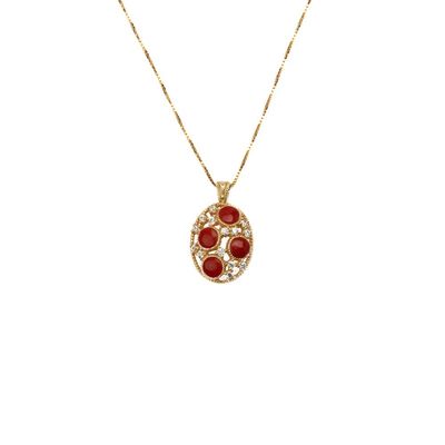 Collana con pendente ovale in corallo rosso e dettagli luminosi