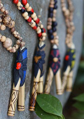 Kuripe with seed beaded necklace Kuripe with seed beaded necklace