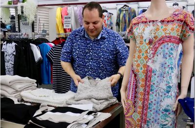 Andrew Zebian arranges display