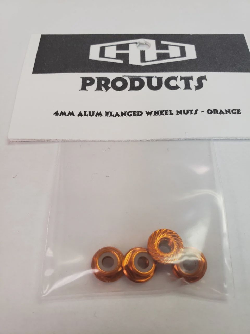 Hamilton Hobbies 4MM flanged nylon locking nut (aluminum, orange-anodized, serrated) (4) (HAM5491O)