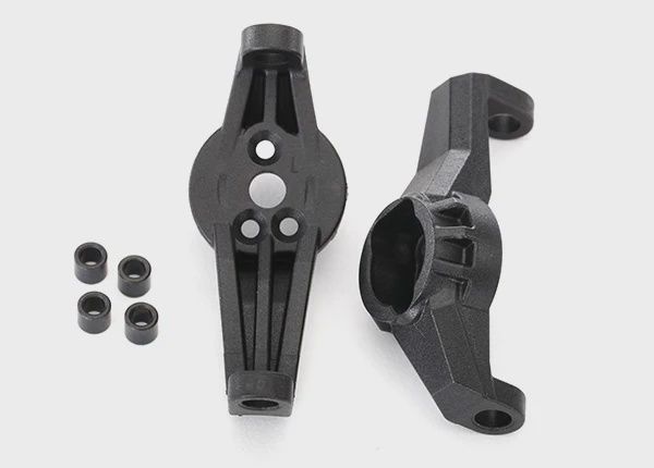 Traxxas Caster blocks (portal drive), left &amp; right/ kingpin bushings (4) (TRA8232)
