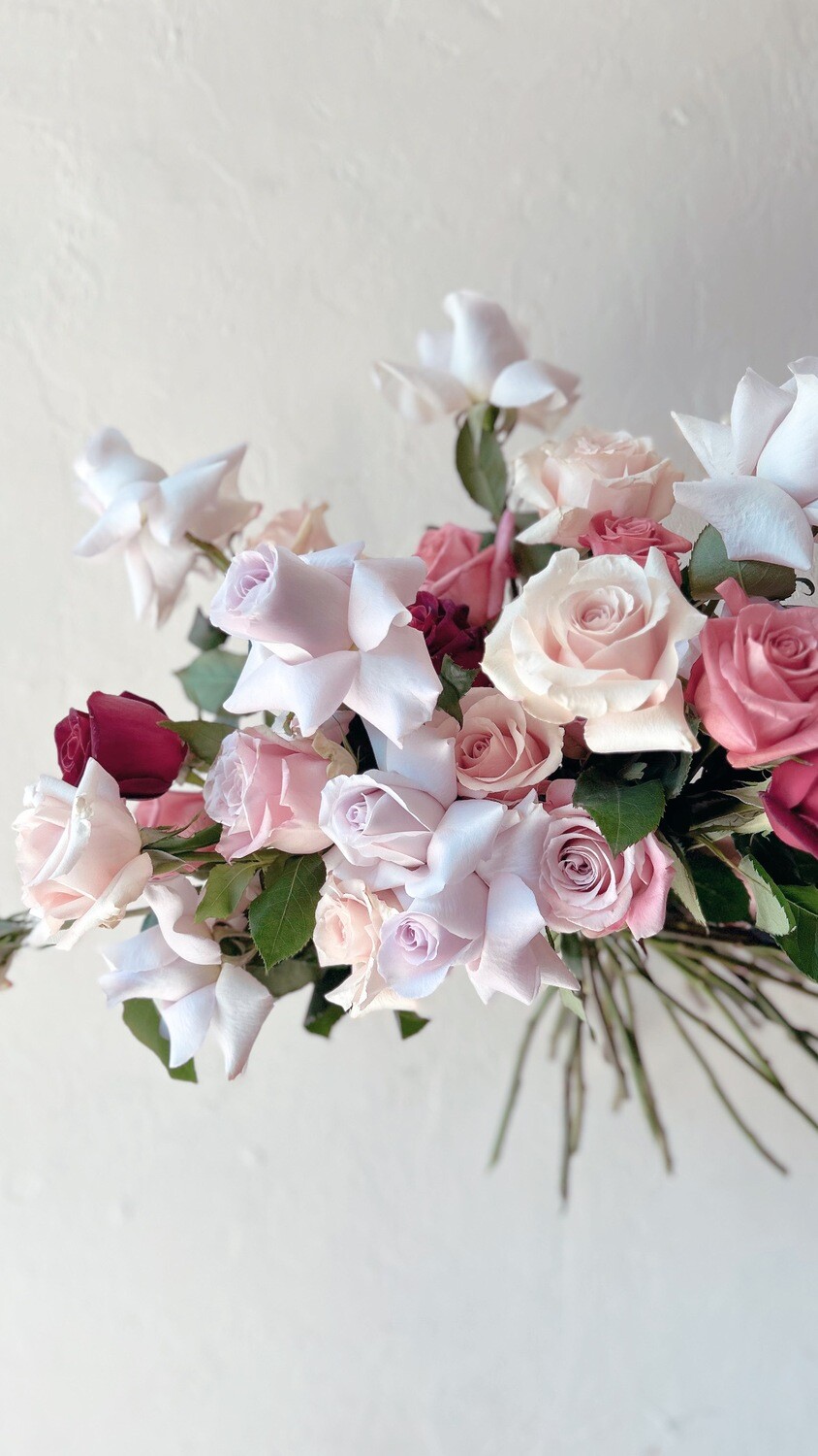 MASSED ROSES HANDTIED BOUQUET