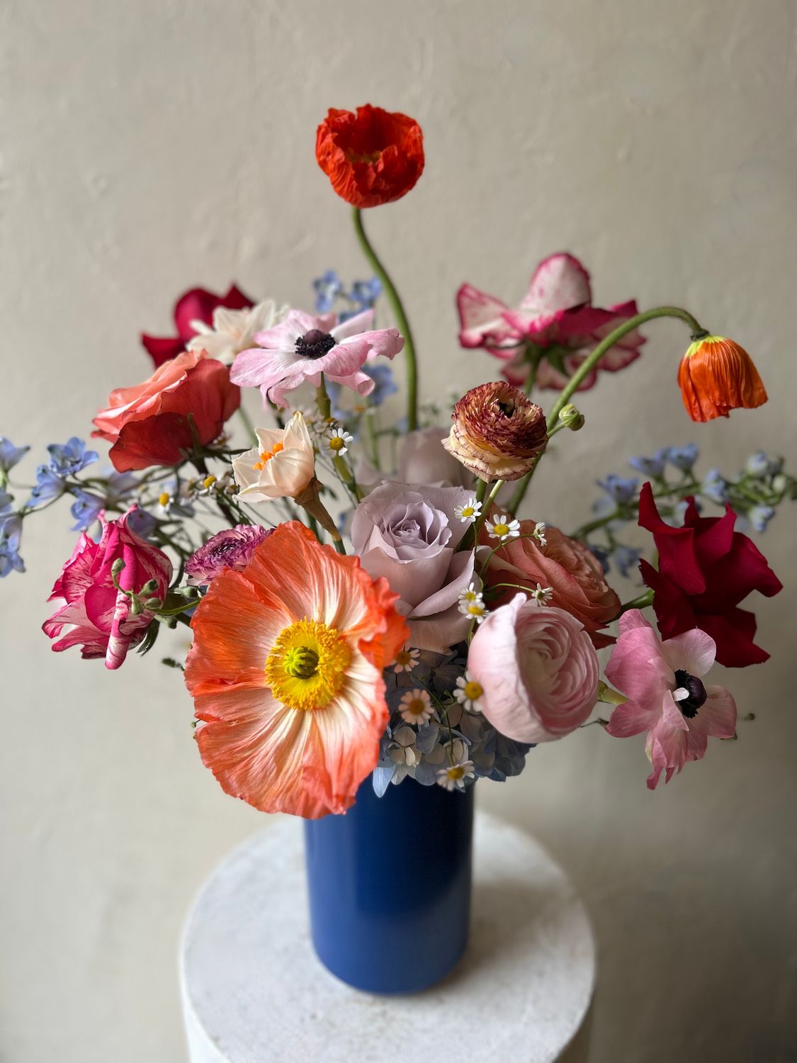 VIBRANT SPRING IN BLUE VASE