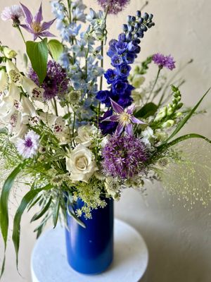 GATHERED GARDEN IN BLUE VASE