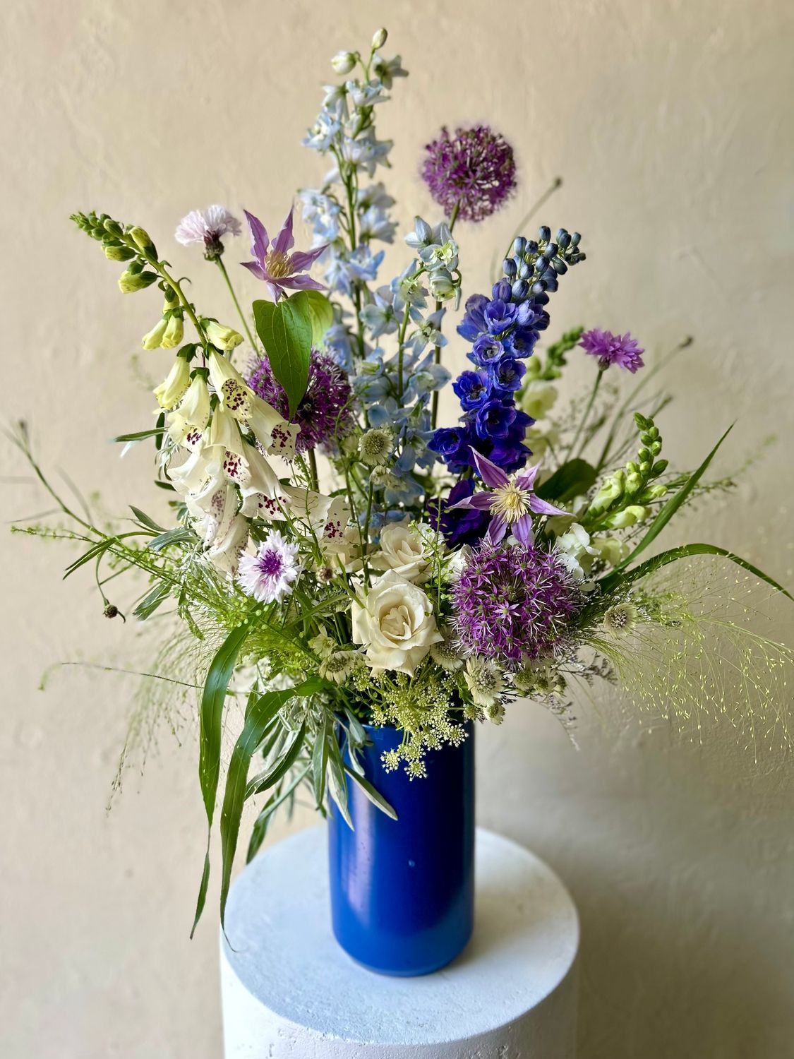 GATHERED GARDEN IN BLUE VASE