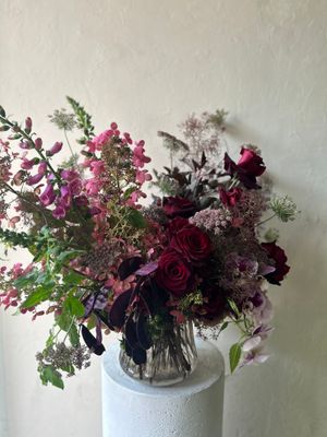 A DOZEN ROSES DONE DIFFERENTLY
