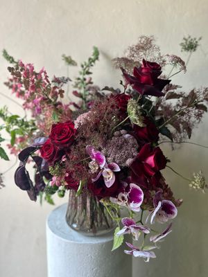 A DOZEN ROSES DONE DIFFERENTLY