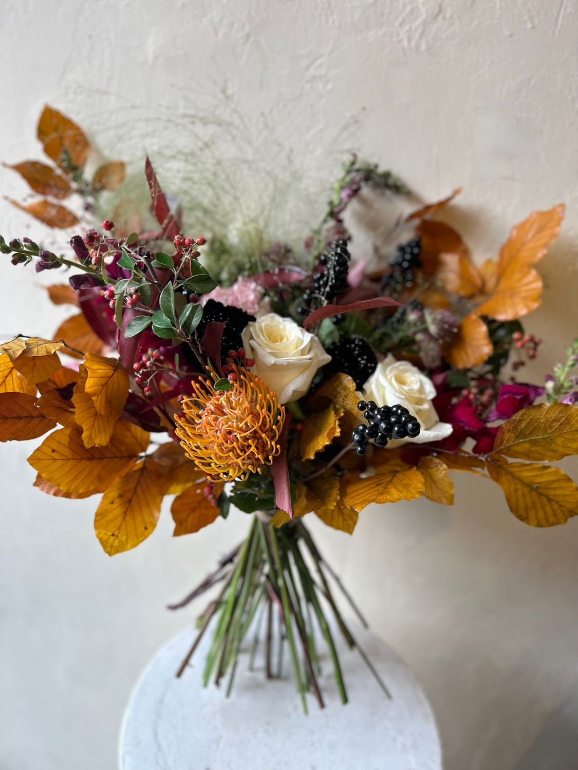 AUTUMN PROTEA HANDTIED BOUQUET