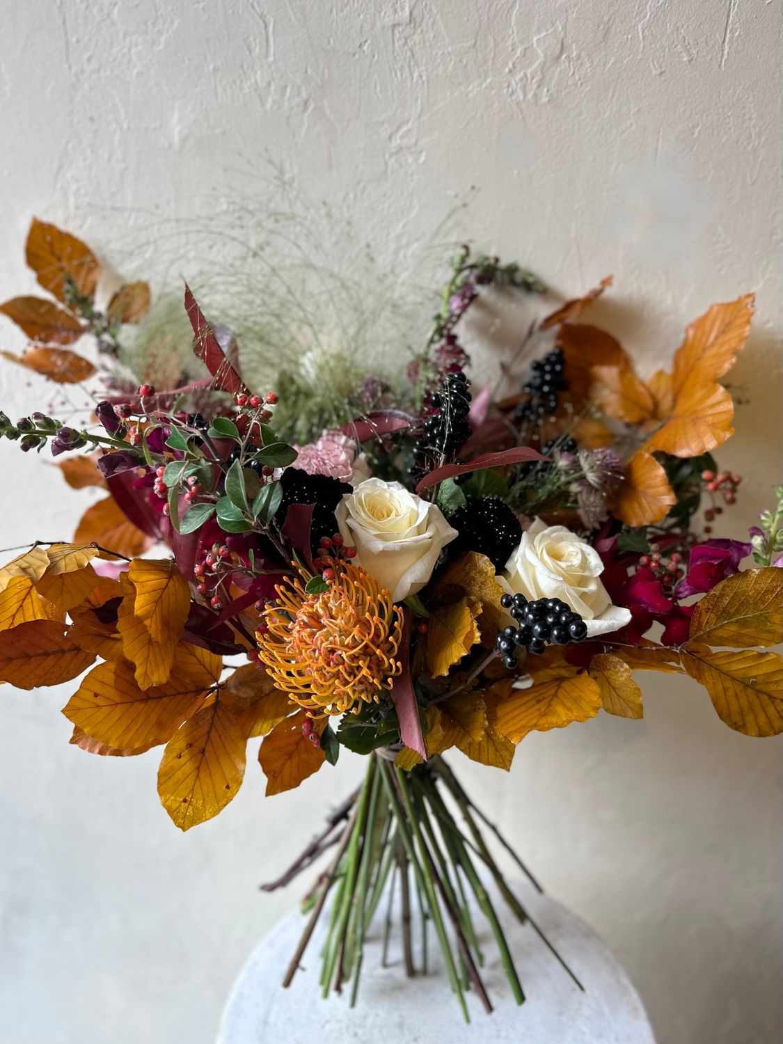 AUTUMN PROTEA HANDTIED BOUQUET