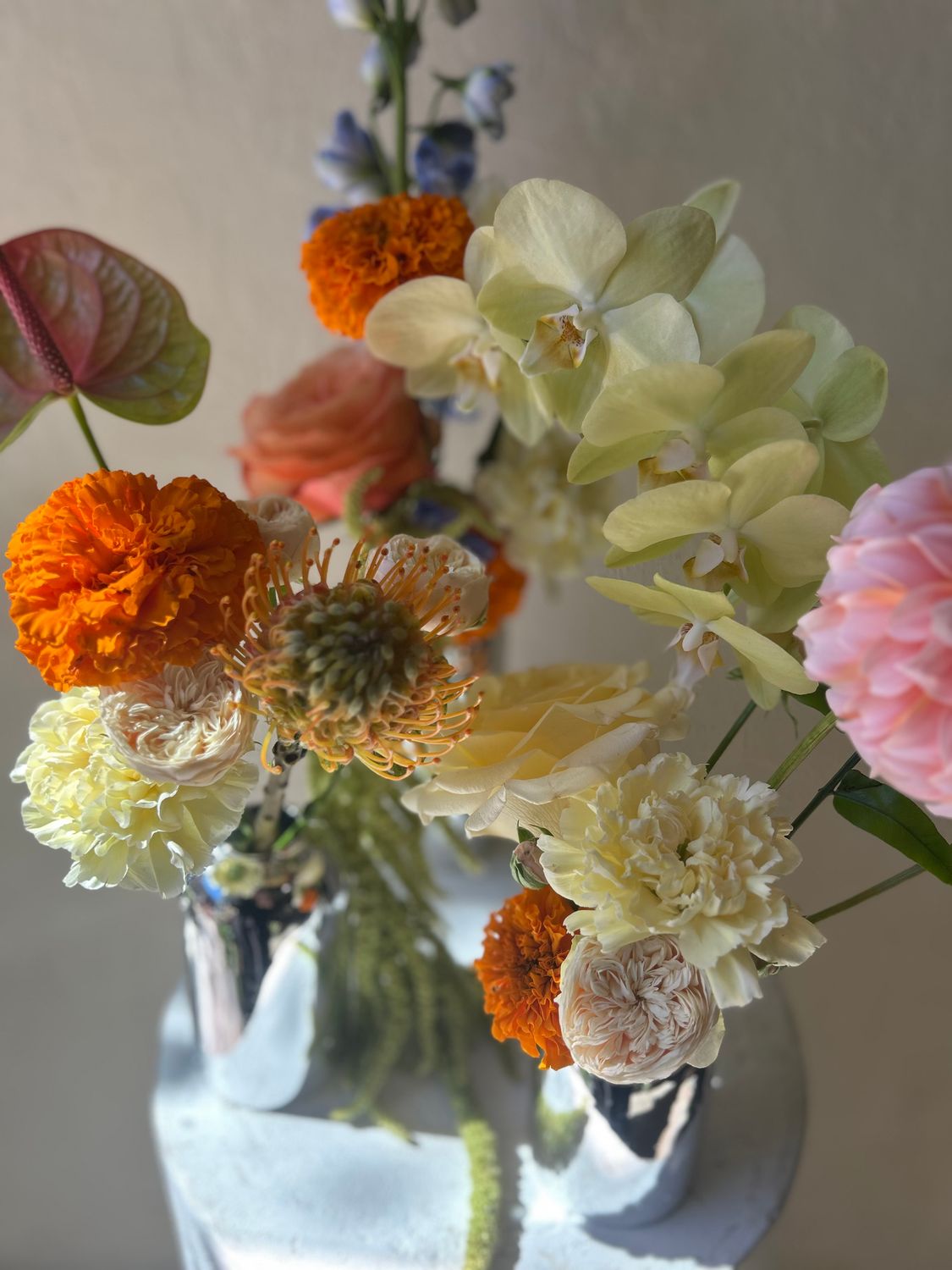 SET OF COLOUR CHROME BUD VASES