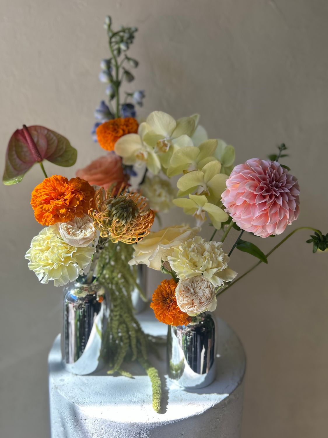SET OF COLOUR CHROME BUD VASES
