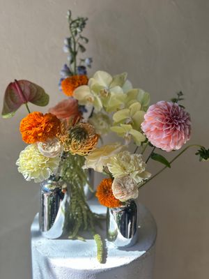 SET OF COLOUR CHROME BUD VASES