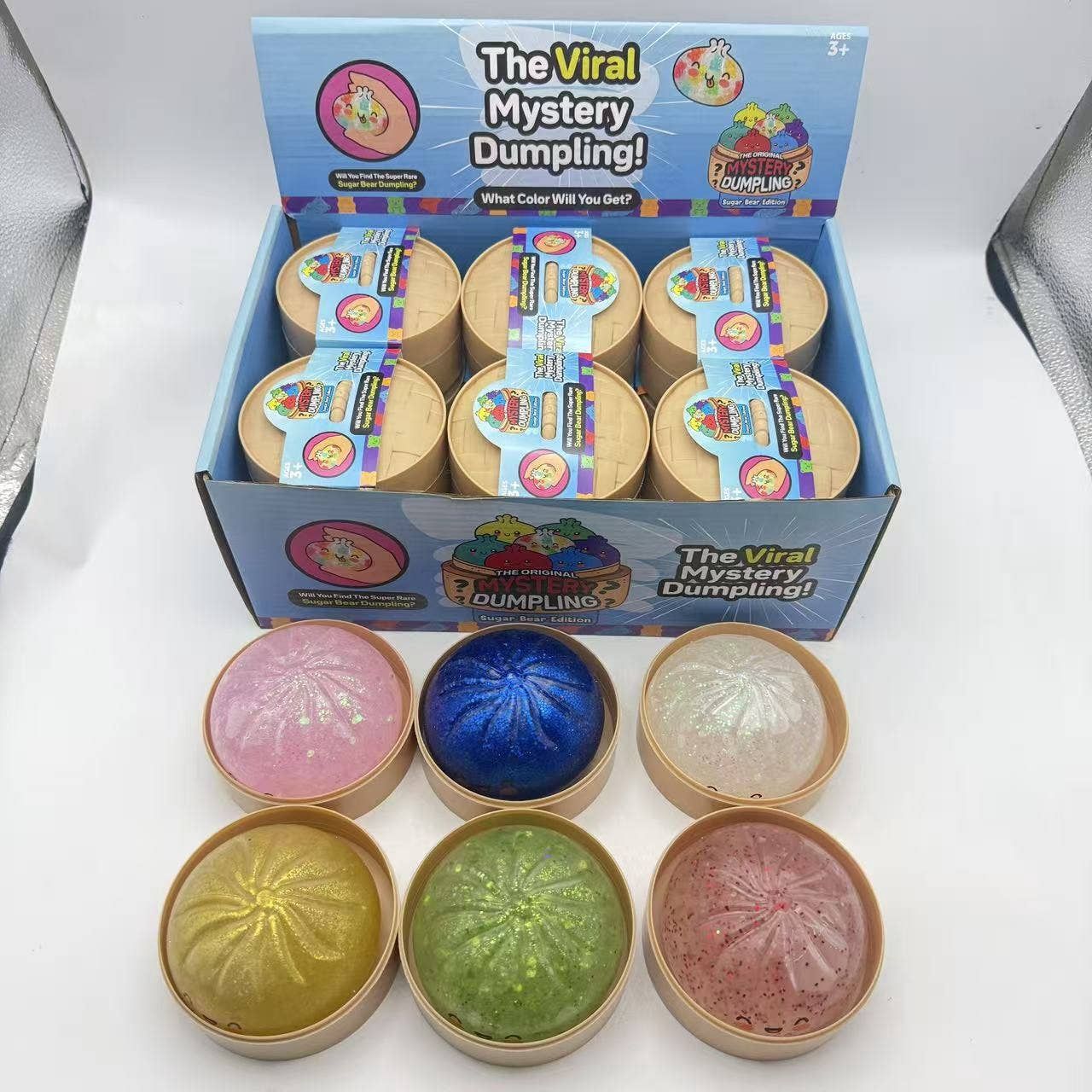 Glitter Dumpling Shape Squishy Stress Relief Toy with Steamer: TPR Dumpling Shape Squishy with Steamer Glitter Clear Shell Emoji Style