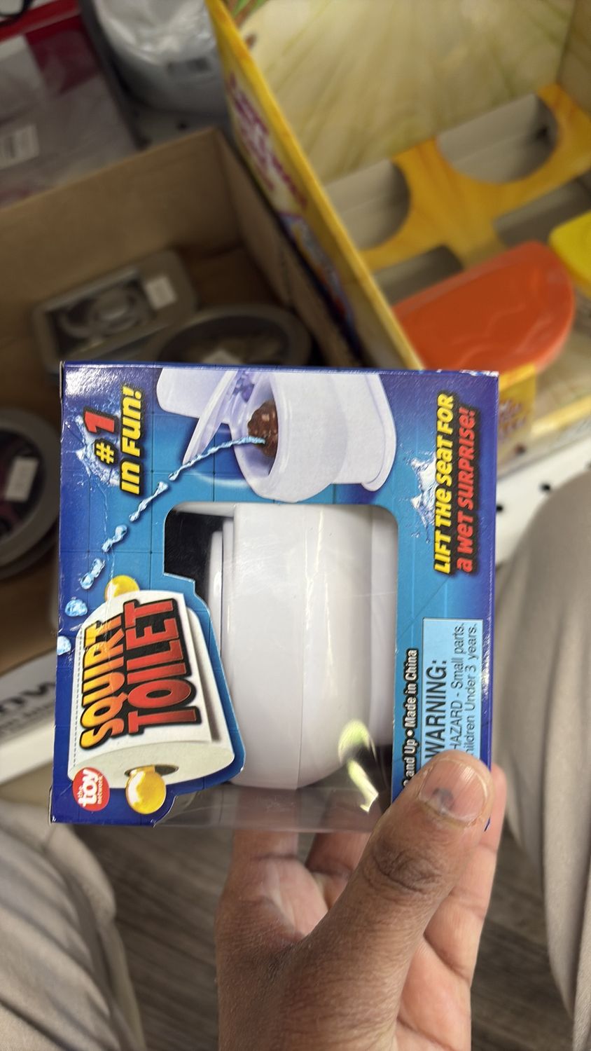 Squirt toilet toy