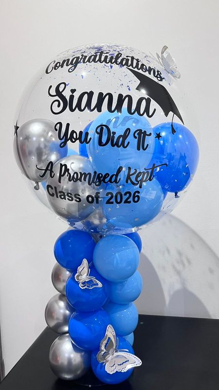 Graduation &amp; Happy Birthday Bobo standing balloon centerpiece