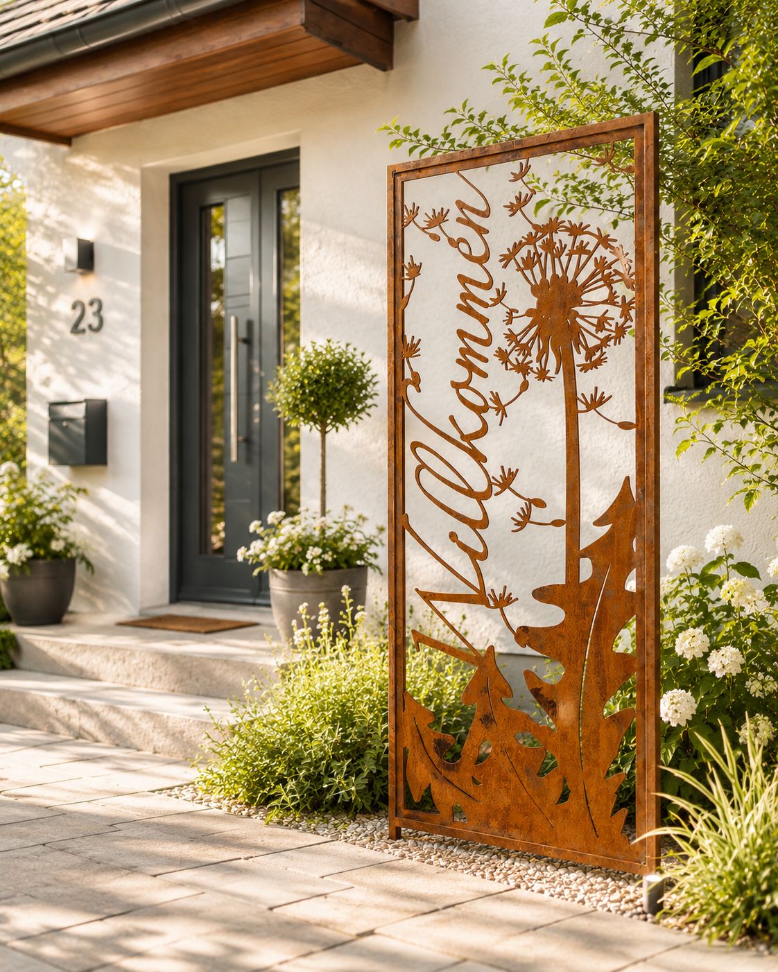 Stele offene Pusteblume Willkommen