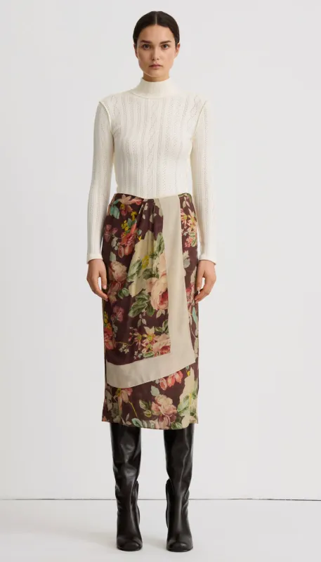 ASYMMETRICAL OVERLAY SKIRT