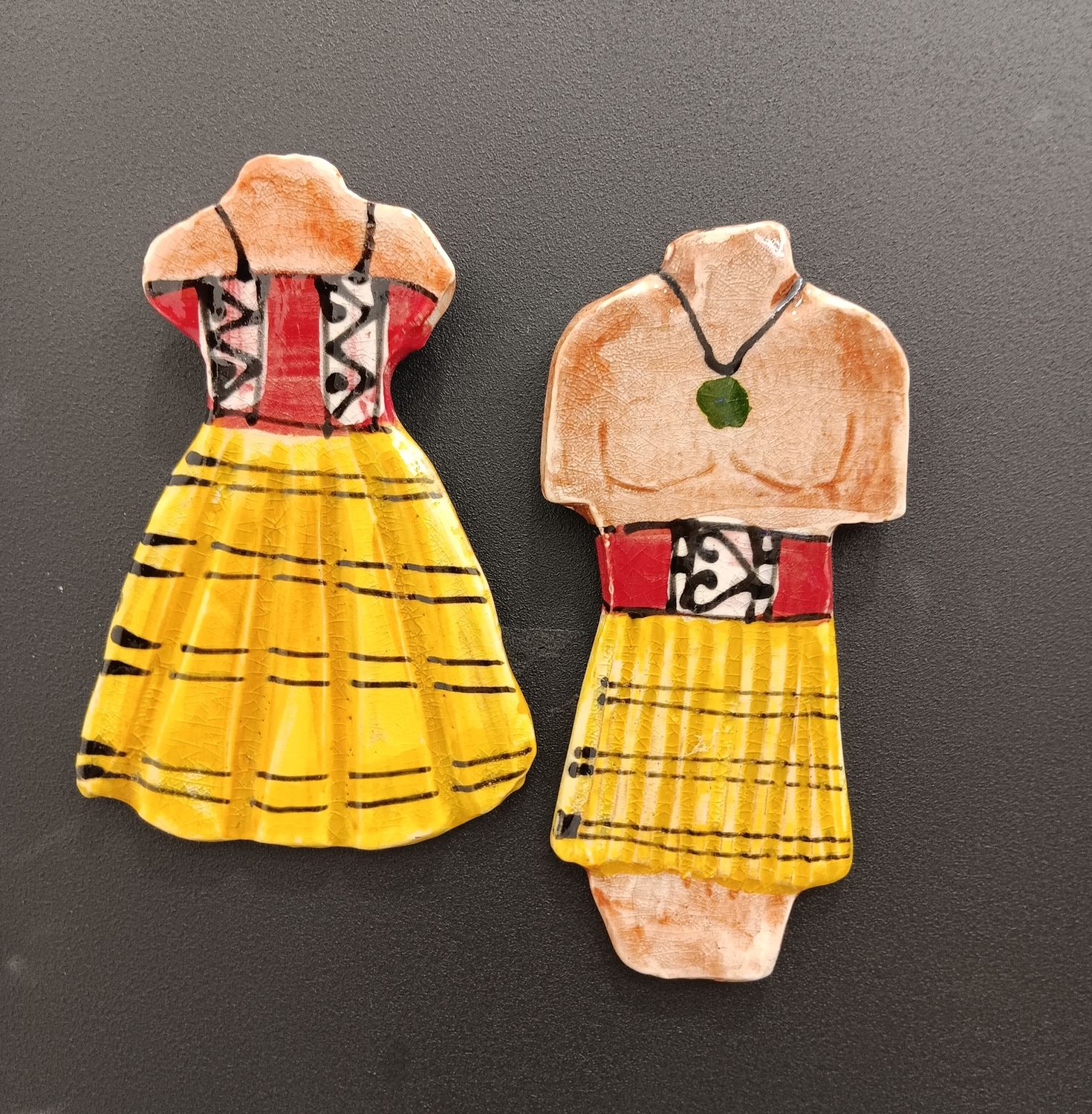 Maori figures :handpainted ceramic