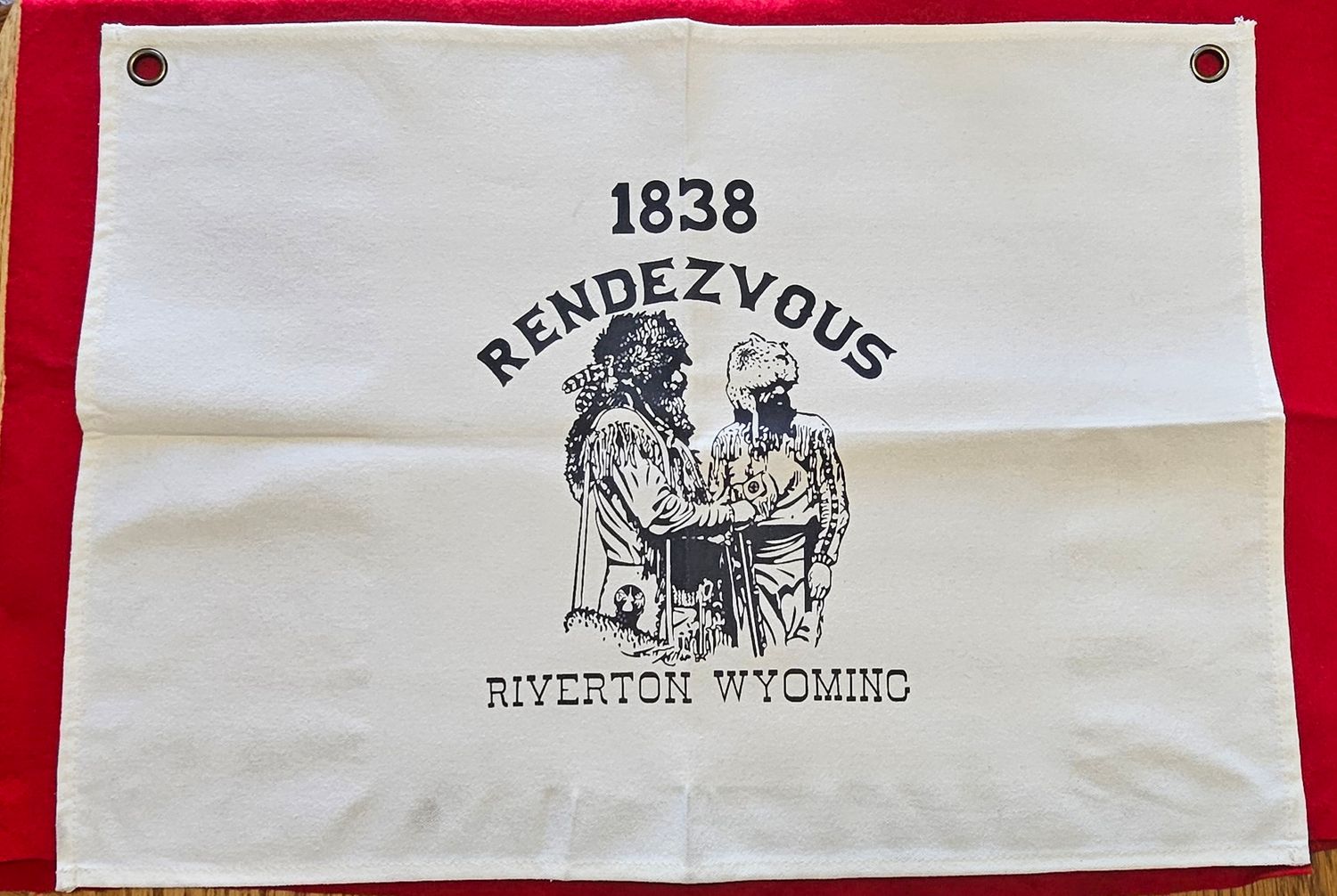 Heavy canvas made flags. Has the 1838 Rendezvous Association Logo. It is 18" x 25". Includes two grommets. Machine Washable.