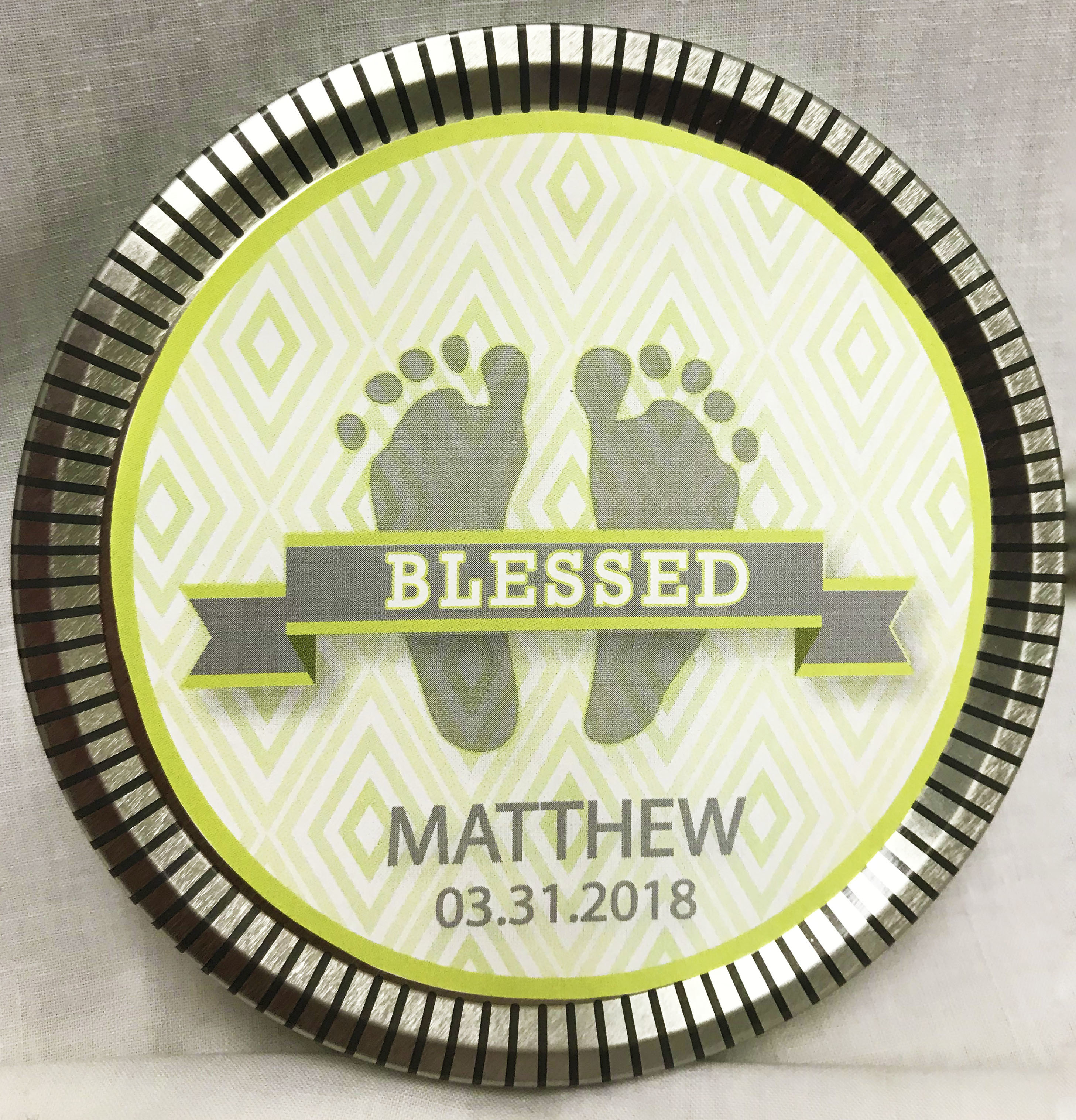 Green Baby Feet Medallion Tin with Gourmet Milk Chocolate Wedges