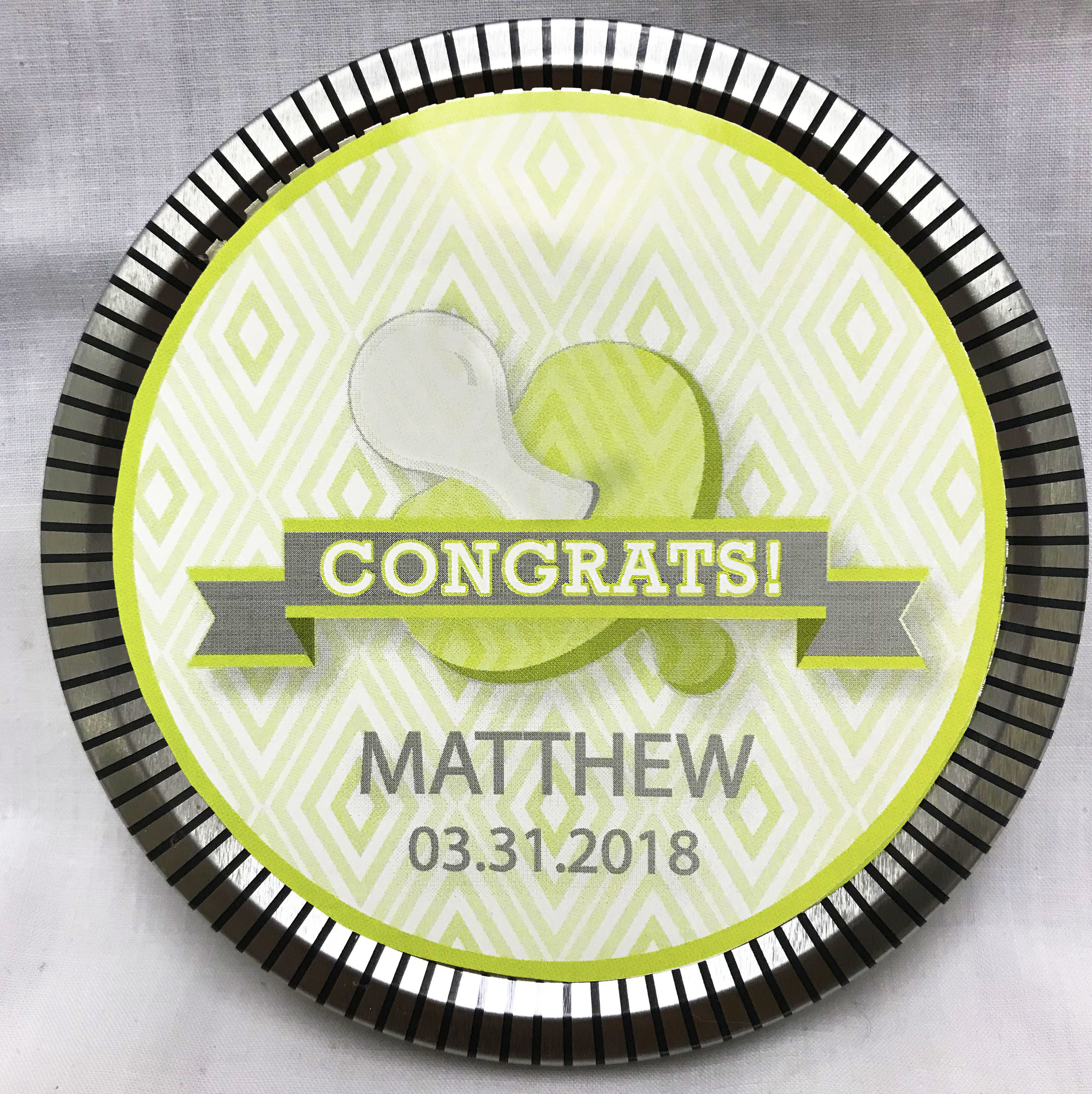 Green Baby Pacifier Medallion Tin with Gourmet Milk Chocolate Wedges