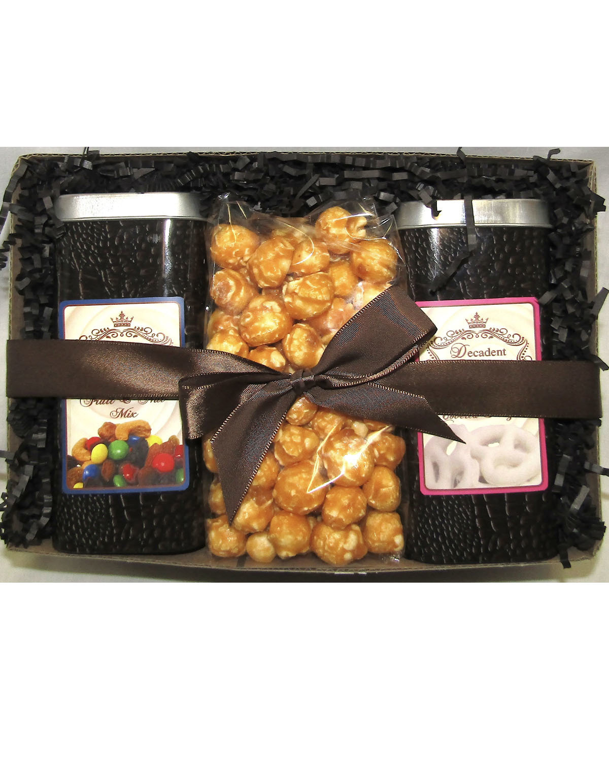 Brown 8.25" Length X 6.25 Wide X 3" Height Crocodile Box Packed With 2  2.5" Wide X 5.5" Height Crocodile Tins Filled With Yogurt Covered Pretzels, Fruit & Nut Mix, Bag Of Almond Caramel Popcorn