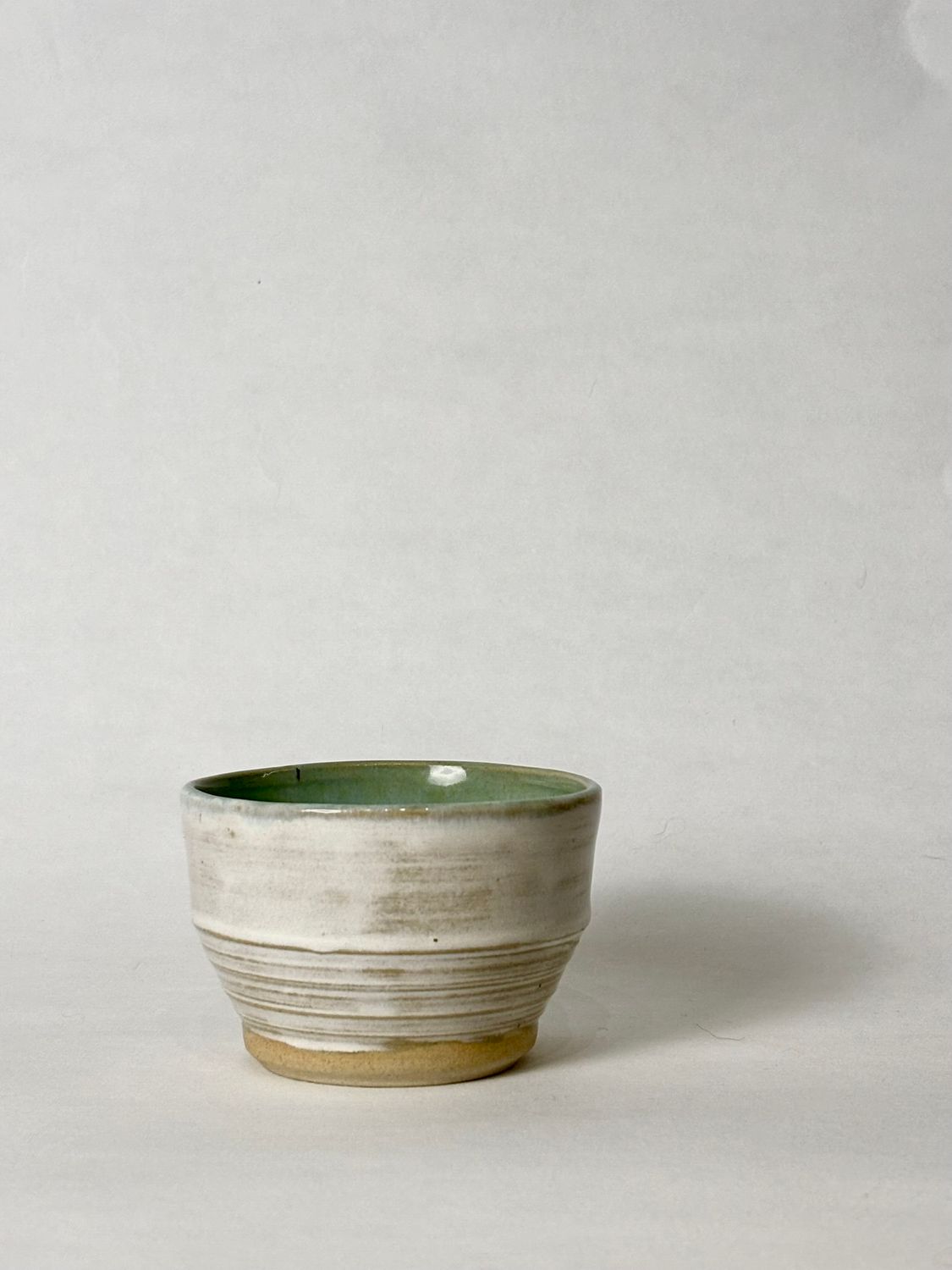 Flat white cup - Honey Flux glaze, with Soft aqua glaze inside