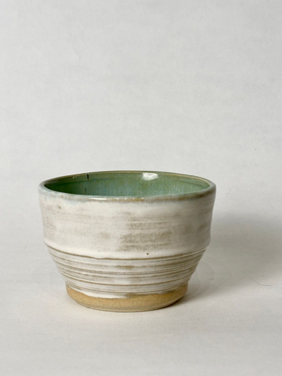 Flat white cup - Honey Flux glaze, with Soft aqua glaze inside