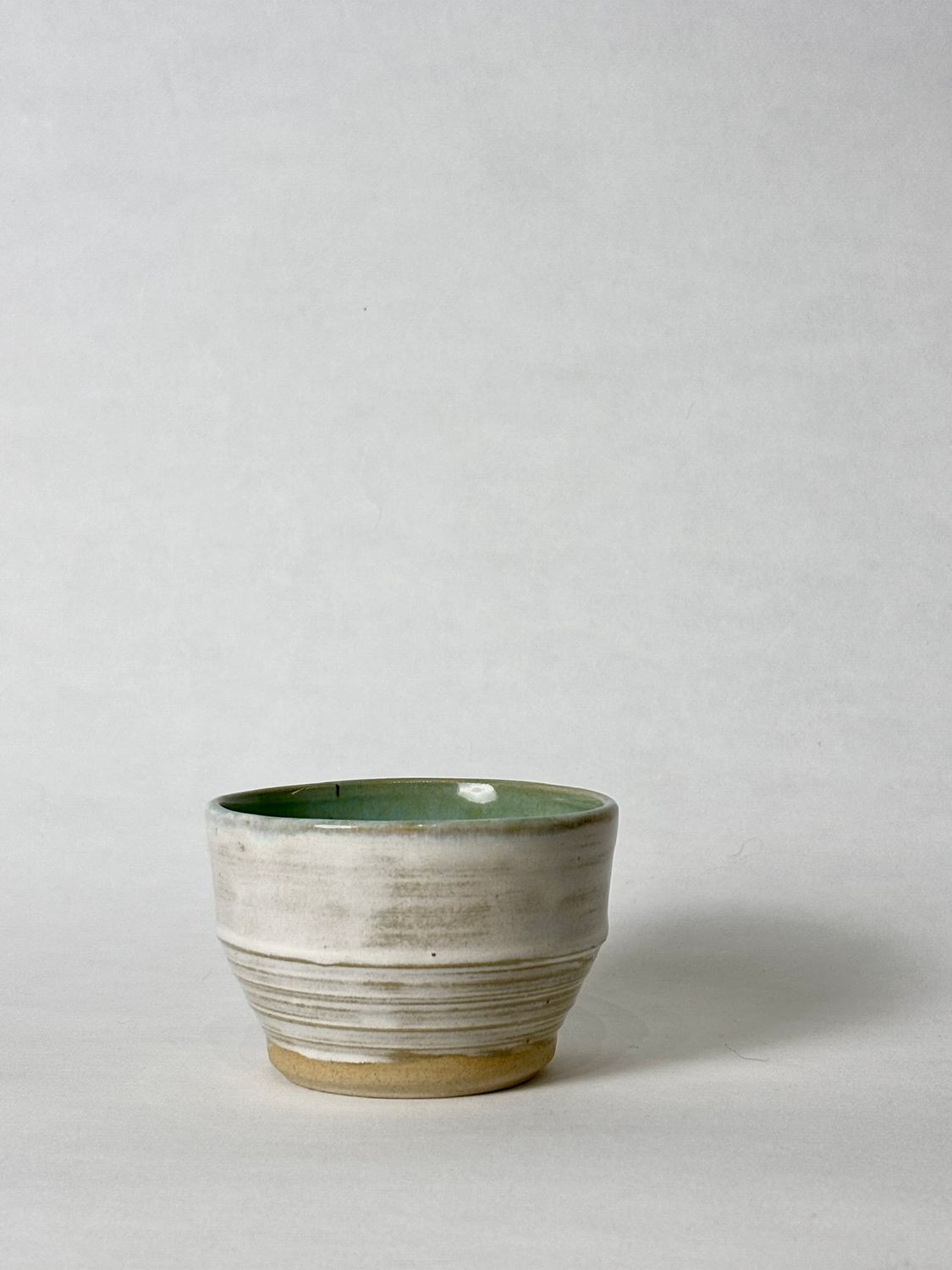 Flat white cup - Honey Flux glaze, with Soft aqua glaze inside